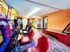 Arcade room featuring a variety of games with vibrant colors and playful designs at 6900 N Ocean Blvd. # 1034, Myrtle Beach, SC 29579