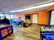 Well-lit arcade room with various gaming machines, offering entertainment for all ages at 6900 N Ocean Blvd. # 1034, Myrtle Beach, SC 29579