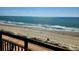 The balcony view showcases the ocean and sandy beach, perfect for enjoying relaxing moments at 6900 N Ocean Blvd. # 1034, Myrtle Beach, SC 29579