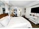 Bright bedroom featuring a comfy bed, TV, and stylish accents at 6900 N Ocean Blvd. # 1034, Myrtle Beach, SC 29579