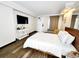 Inviting bedroom with bed, TV, and a bright, airy atmosphere at 6900 N Ocean Blvd. # 1034, Myrtle Beach, SC 29579