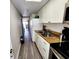 Efficient kitchen with stainless appliances and granite countertops at 6900 N Ocean Blvd. # 1034, Myrtle Beach, SC 29579