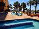 Lazy river surrounded by lush palm trees, offering a relaxing water experience at 6900 N Ocean Blvd. # 1034, Myrtle Beach, SC 29579