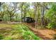 Cabin with a peaceful setting, a manicured lawn, and natural landscaping at 70 Izard Pl., Georgetown, SC 29440