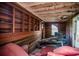 Distressed cabin interior with exposed wood walls and damage, reflecting a need for restoration at 70 Izard Pl., Georgetown, SC 29440