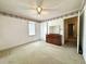 Bedroom with carpet, ceiling fan, closet and trim at 701 Martin Luther King Dr., Andrews, SC 29510
