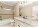 Bathroom featuring granite counters and tiled shower at 7041 Turtle Cove Dr., Myrtle Beach, SC 29579