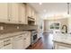 The kitchen has a granite countertop, tile backsplash, and a stainless steel stove at 7041 Turtle Cove Dr., Myrtle Beach, SC 29579