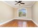 The room has wood floors and a curved window providing natural light at 7041 Turtle Cove Dr., Myrtle Beach, SC 29579