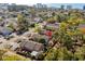 Aerial view of beachside townhomes near the ocean, featuring red pin for desired unit and lush landscaping at 707 S 26Th Ave. S # L, North Myrtle Beach, SC 29582