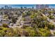 Aerial view of a charming community near the ocean and high-rise condos, showcasing lush green surroundings at 707 S 26Th Ave. S # L, North Myrtle Beach, SC 29582