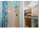 Bright bathroom with a shower-tub combo and modern fixtures, offering a clean and functional space at 707 S 26Th Ave. S # L, North Myrtle Beach, SC 29582