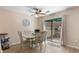 Bright breakfast nook with backyard access and a ceiling fan at 707 S 26Th Ave. S # L, North Myrtle Beach, SC 29582
