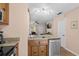 Kitchen featuring stainless steel appliances and a breakfast bar at 707 S 26Th Ave. S # L, North Myrtle Beach, SC 29582
