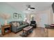 Bright living room showcasing hardwood floors, comfortable furniture, and light, neutral-color walls at 707 S 26Th Ave. S # L, North Myrtle Beach, SC 29582