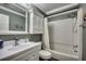 Clean bathroom featuring a vanity with sink, toilet, a mirrored medicine cabinet, and a shower/tub combo at 720 N Waccamaw Dr. # 207, Garden City Beach, SC 29576