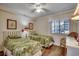Charming bedroom with two twin beds, coastal decor, and a window offering natural light at 720 N Waccamaw Dr. # 207, Garden City Beach, SC 29576