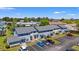 Aerial view of community featuring multiple townhomes with parking, and beautiful trees at 775 Plantation Dr. # 87, Little River, SC 29566