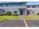 Charming townhome featuring well-maintained landscaping and a welcoming entrance at 775 Plantation Dr. # 87, Little River, SC 29566