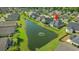 Aerial view of a home backing up to a pond with a fountain at 809 Covelo Ln., Myrtle Beach, SC 29579