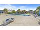 Community pool area surrounded by lounge chairs and manicured landscaping at 809 Covelo Ln., Myrtle Beach, SC 29579