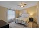 Inviting bedroom with a comfortable bed, side tables with lamps, and neutral decor at 8404 Bloomwood Dr., Myrtle Beach, SC 29588