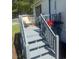 Inviting outdoor deck with comfortable seating and decorative plants, perfect for relaxation at 8404 Bloomwood Dr., Myrtle Beach, SC 29588