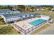 Community outdoor pool area with a pool, hot tub, and some lounge chairs at 8404 Bloomwood Dr., Myrtle Beach, SC 29588