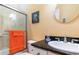 Bathroom featuring tile flooring, a granite countertop, and a glass enclosed shower at 9 Gasparilla Circle, Murrells Inlet, SC 29576