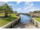 Community boat ramp surrounded by well-manicured lawn and easy access to waterway at 9 Gasparilla Circle, Murrells Inlet, SC 29576