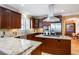 Gourmet kitchen featuring granite countertops, stainless steel appliances, and custom cabinets at 9 Gasparilla Circle, Murrells Inlet, SC 29576