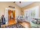Cozy seating area featuring a recliner, sofa and an access to the balcony at 9 Gasparilla Circle, Murrells Inlet, SC 29576