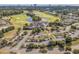 Panoramic aerial view showcases the golf course, lake, and luxurious homes in a beautiful community at 9407 Venezia Circle, Myrtle Beach, SC 29579
