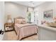 Cozy bedroom with a plush bed, soft lighting, and neutral decor, creating a relaxing atmosphere at 9407 Venezia Circle, Myrtle Beach, SC 29579