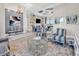Bright living room with comfortable seating, decorative shelving, and modern artwork at 9407 Venezia Circle, Myrtle Beach, SC 29579