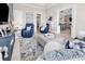 Inviting living room with a neutral color palette, plush seating, and a view into the kitchen at 9407 Venezia Circle, Myrtle Beach, SC 29579