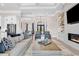 Open-concept living area featuring a modern kitchen, cozy seating, and elegant design at 9407 Venezia Circle, Myrtle Beach, SC 29579