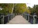 Picturesque boardwalk with black railings winding through serene nature, offering scenic walking experience at 978 Cherrystone Loop, Conway, SC 29526