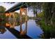 Scenic bridge over water with reflections and lush trees, offering tranquil waterfront access at 978 Cherrystone Loop, Conway, SC 29526