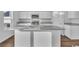 Bright kitchen with granite countertops, stainless steel appliances, and a functional center island at 978 Cherrystone Loop, Conway, SC 29526