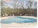 Outdoor swimming pool with ladder and surrounding fence, offering a place to relax and exercise at 978 Cherrystone Loop, Conway, SC 29526