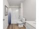 Bathroom featuring a shower/tub combination, a toilet, vinyl plank flooring, and a single vanity at 985 Cherrystone Loop, Conway, SC 29526