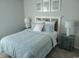 Bright bedroom featuring matching nightstands, luxury carpeting and neutral paint at 985 Cherrystone Loop, Conway, SC 29526
