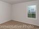 Bedroom featuring carpet flooring and a window at 985 Cherrystone Loop, Conway, SC 29526