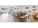 Bright dining area with hardwood floors, modern lighting, and an open-concept design at 985 Cherrystone Loop, Conway, SC 29526