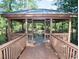 Wooden gazebo with a view of the river, perfect for relaxation and enjoying nature at 985 Cherrystone Loop, Conway, SC 29526