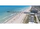 Expansive aerial view of the coastline, featuring a pier, beach, buildings, and clear blue ocean waters at 1016 Saluda River Rd., Myrtle Beach, SC 29588