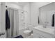 Bathroom with shower and toilet and a large mirror at 1016 Saluda River Rd., Myrtle Beach, SC 29588