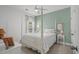 Bedroom featuring a four-poster bed with a ceiling fan at 1016 Saluda River Rd., Myrtle Beach, SC 29588