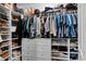 Walk-in closet with custom shelving and hanging rods at 1016 Saluda River Rd., Myrtle Beach, SC 29588